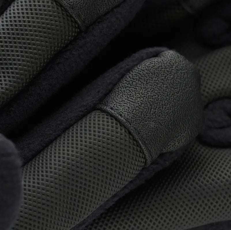 Black tactical glove with textured grip pattern from M-Tac Gloves Fleece Thinsulate