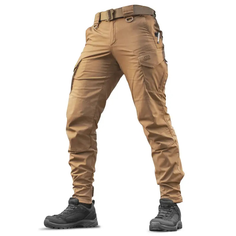 Khaki M-Tac Tactical Pants Aggressor Gen.II Flex with belt loops and black combat boots