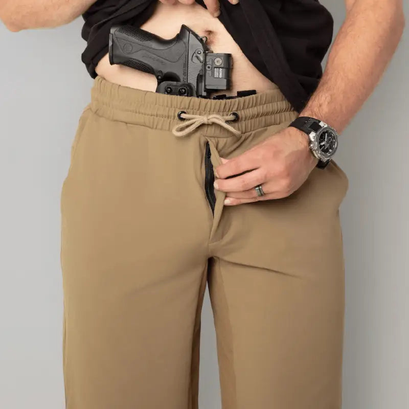 Man wearing Carrier Shorts Mk.II with concealed carry handgun in Arrowhead Tactical Apparel