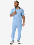 Healthcare worker in light blue medical scrubs showcasing Men’s Five-Pocket Scrub Top