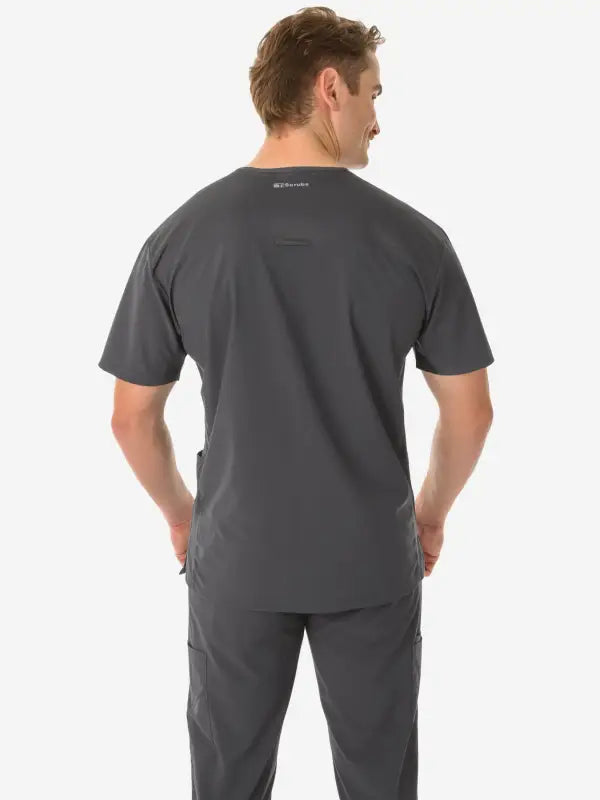 Back view of dark gray men’s five-pocket scrub uniform for enhanced comfort and utility