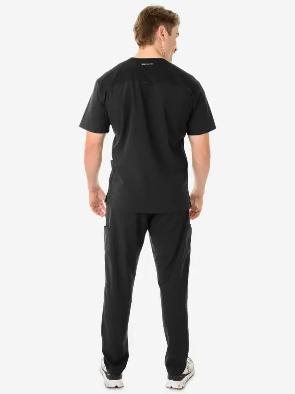 Back view of Men’s Five-Pocket Scrub Top in black medical scrubs uniform