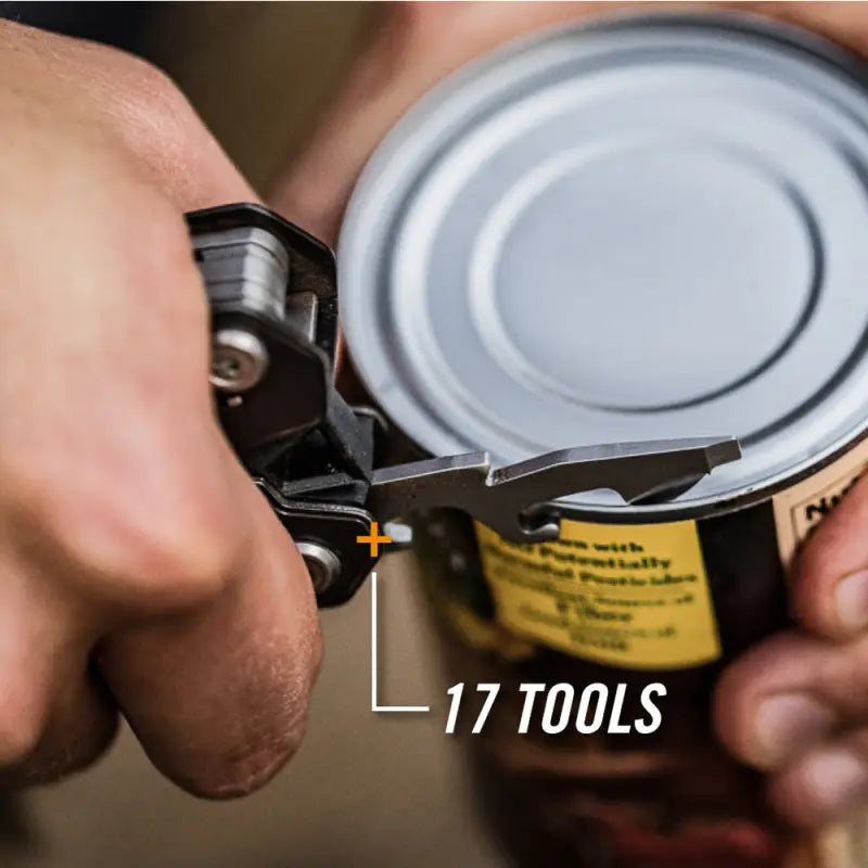 Gerber Gear 31-003882 Truss multitool opening a can, ideal for first responders and firefighters