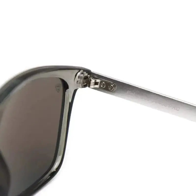 Partial view of NADO Ice Ghost sunglasses frame highlighting the temple hinge and arm