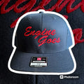 Navy blue Yupoong snapback cap with red Engine Goes text for first responders