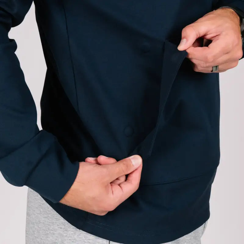 Navy blue durable hoodie with a hand pocket and smooth draws in the Durable Concealment Hoodie