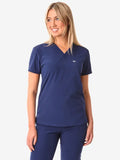 Navy blue women’s tuckable one-pocket scrub top with V-neck design
