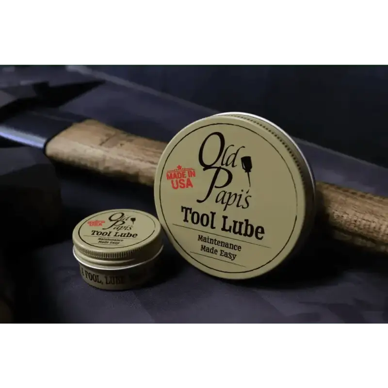 Metal tin of Old Papi’s Tool Lube showcasing the product label and secret sauce features