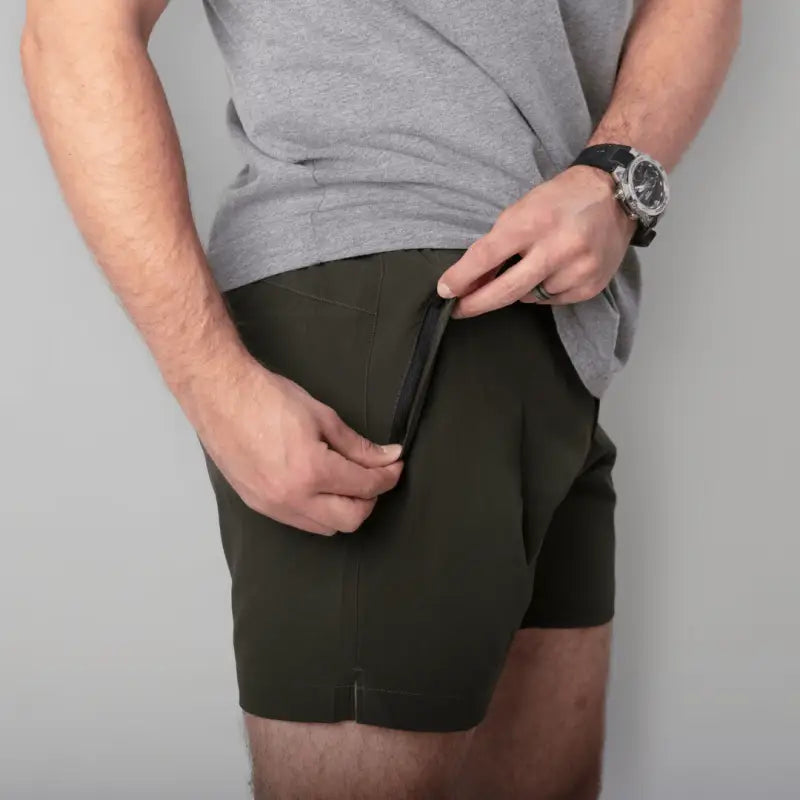 Olive green carrier training shorts with 5-inch inseam for concealed carry training