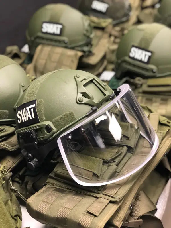 Olive green SWAT helmet with ballistic glass face shield for tactical body armor by Redemption Tactical