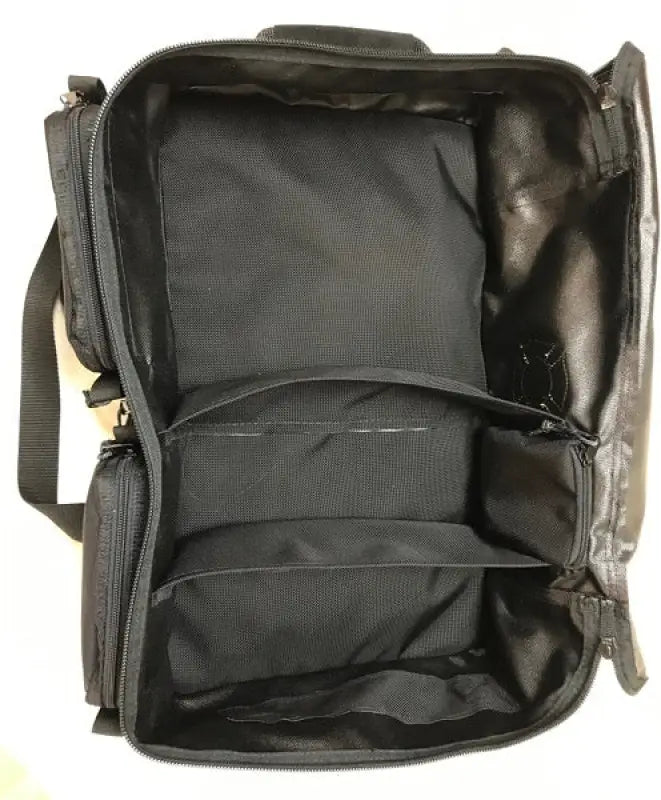 Open black Wildland Fire Gear Bag with suede leather wrap and dual compartments
