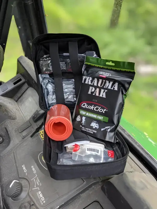 Open black trauma kit for first responders, firefighter, and police emergency use
