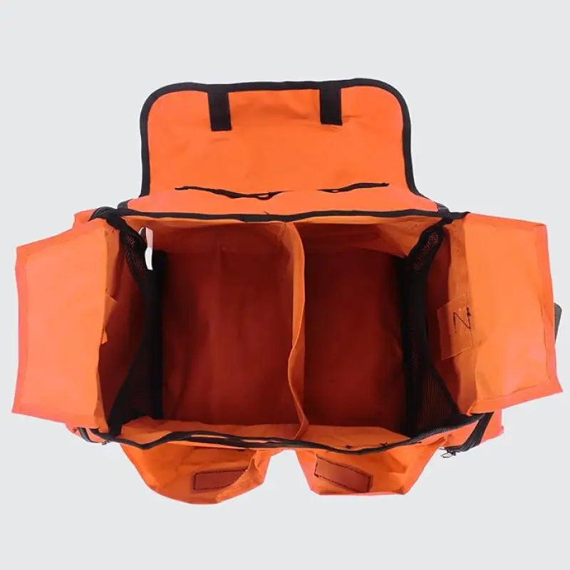 Open orange duffel bag for first responders in the Fully Stocked EMT Trauma Kit