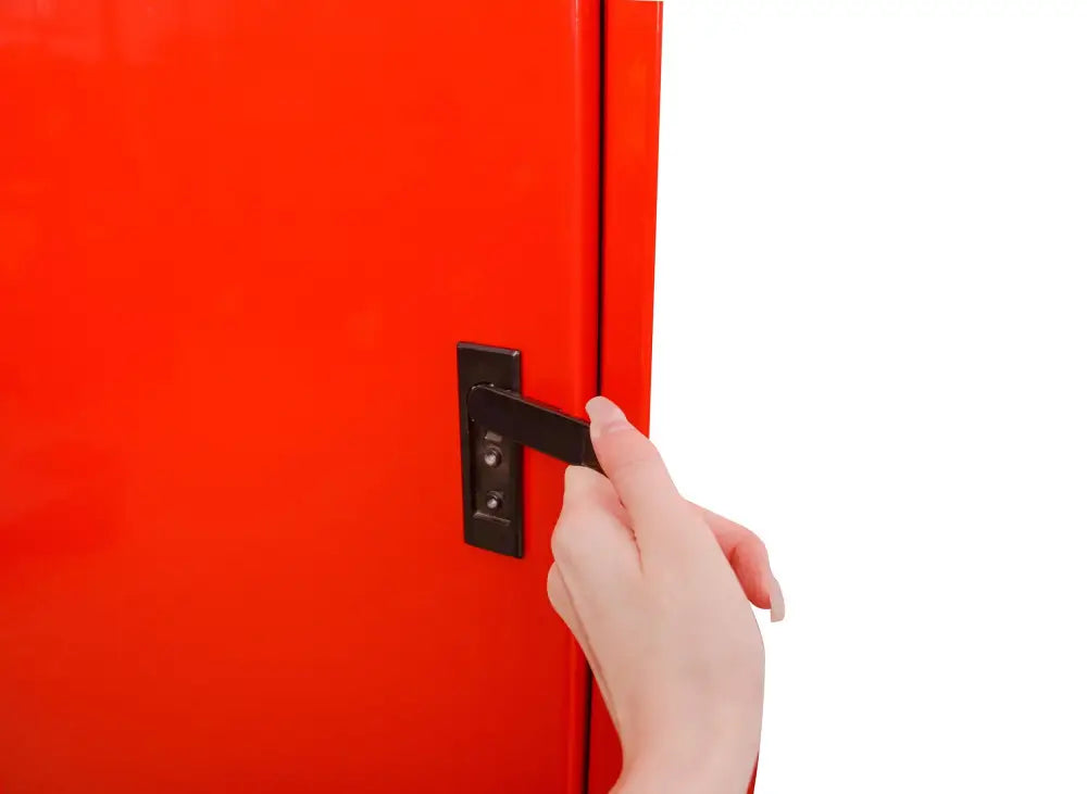 Red door with black handle on a Line2Design evacuation stair chair wall storage cabinet