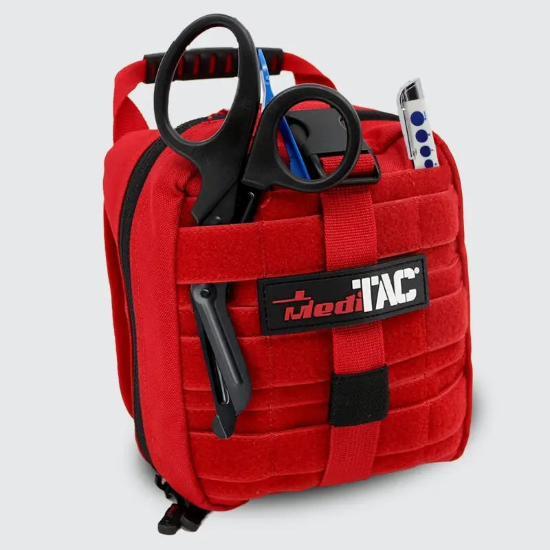 Red medical bag with tools for first responders, firefighters, and police trauma kits