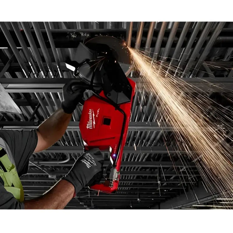 Red M18 Fuel™ cut-off saw with sparks showcasing Milwaukee 2786-20 bare tool and One-Key™ technology
