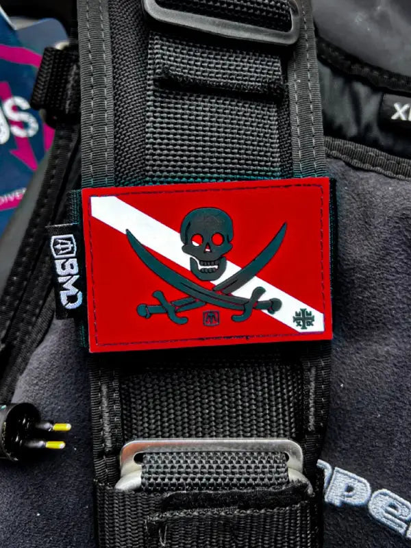 Red pirate scuba flag patch on BMD Slap Straps with Solas Tape for first responders