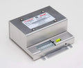 Silver metal electronic device from Whelen Howler Low-Frequency Siren Set for first responders