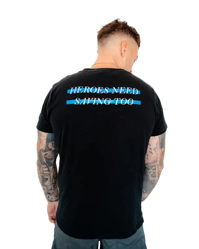 Black Stigma-Breaking Unisex Tee with blue text saying HEROES NEED SAVING TOO, supports mental health