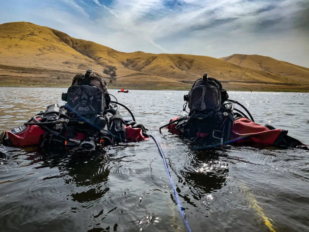 Two divers in water using BA SHIELDS FFM Shield, ideal for first responders and firefighter rescue missions