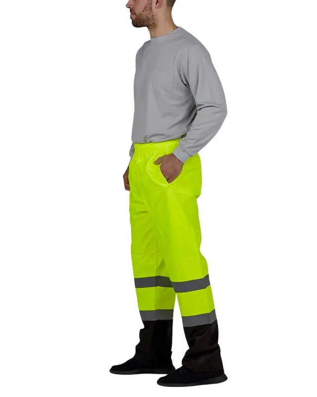 High-visibility yellow UHV823 Hi-Vis Utility Rain Pants with reflective stripes and knee panels