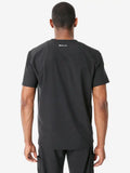 Back view of a plain black Men’s Double-Pocket Scrub Top with a logo near the neckline