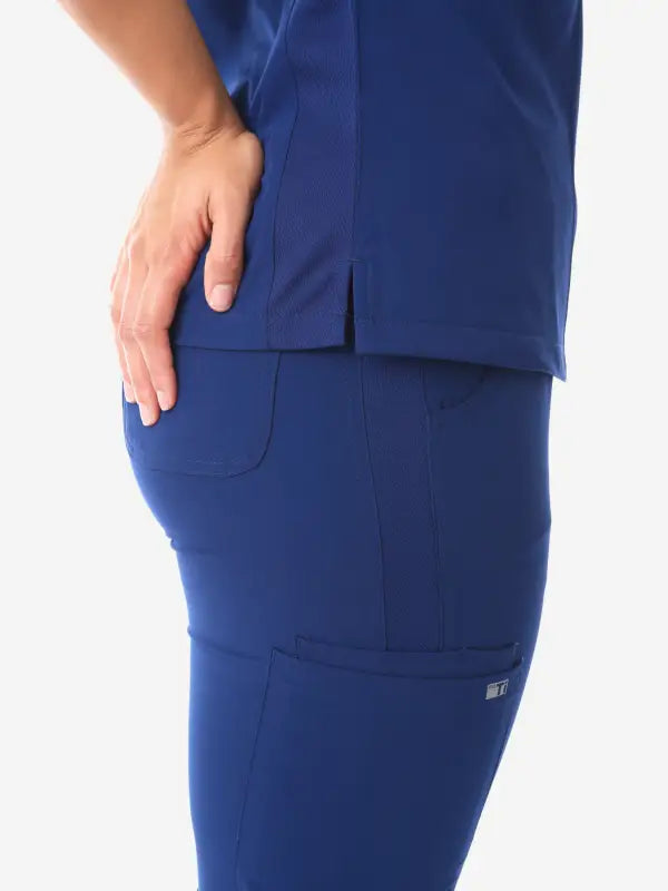 Navy blue women’s four-pocket scrub pants with cargo pockets for comfort and style