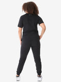 Black cotton jogger jumpsuit with short sleeves and tapered legs for women’s four-pocket scrub