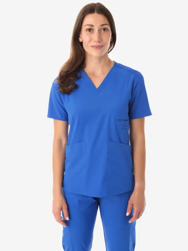 Royal blue women’s four-pocket scrub uniform featuring v-neck top and matching pants