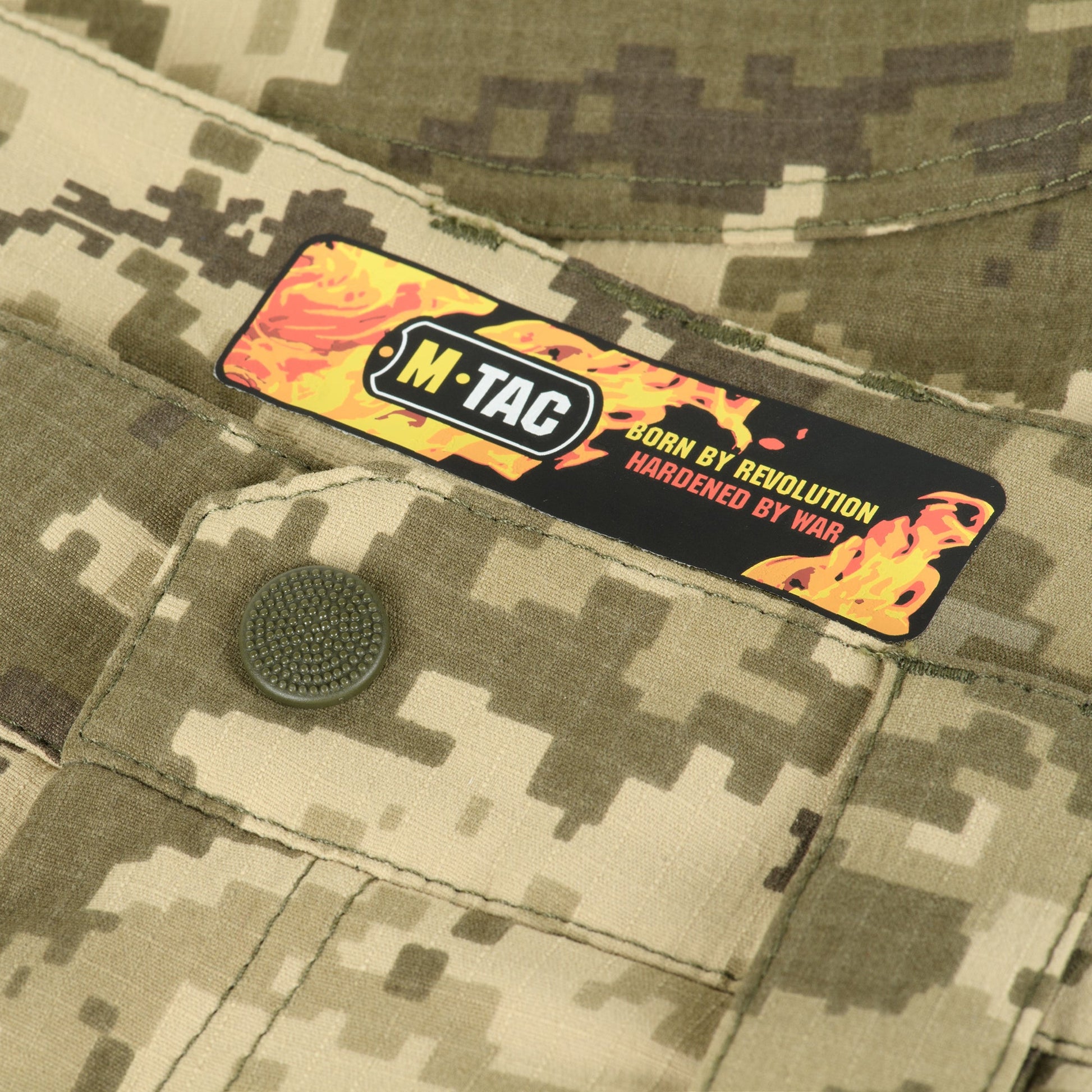 Back view of M-Tac Tactical Pants Sahara Flex Light emphasizing sun-fade resistant fabric and ergonomic design for unrestricted movement.