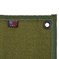 An organized Tactical Patch Mat filled with patches, demonstrating its storage capacity.