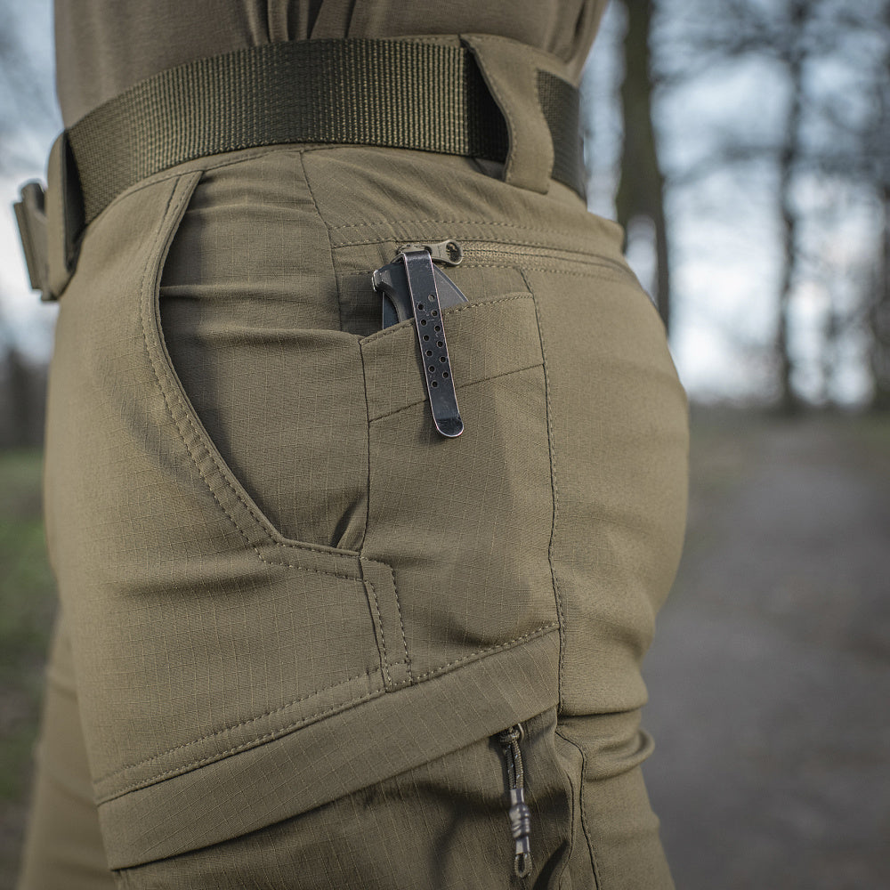 Close-up of M-Tac Tactical Pants Sahara Flex Light highlighting the flexible material for unrestricted movement and durability.