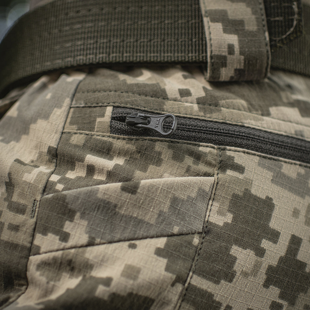 M-Tac Tactical Pants Sahara Flex Light in action, demonstrating unrestricted movement in outdoor settings.