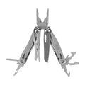 M-Tac Multitool Type 7 showcased with pliers and various tools spread out for outdoor use.