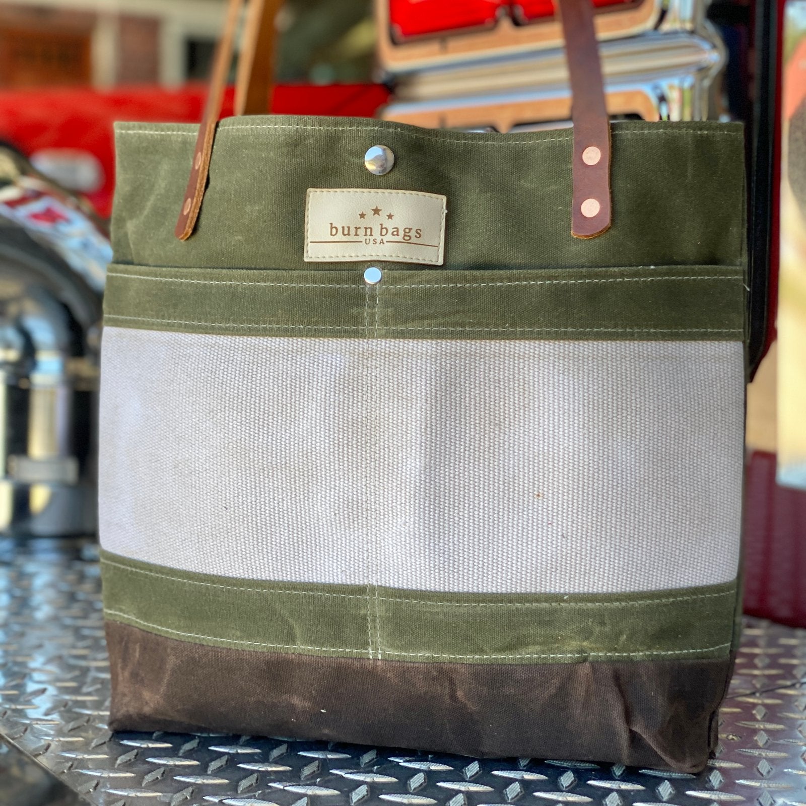 Interior view of the Olive Green Classic Burn Bag featuring fully lined compartments and large pockets for organization, ideal for classic burn bags lovers.