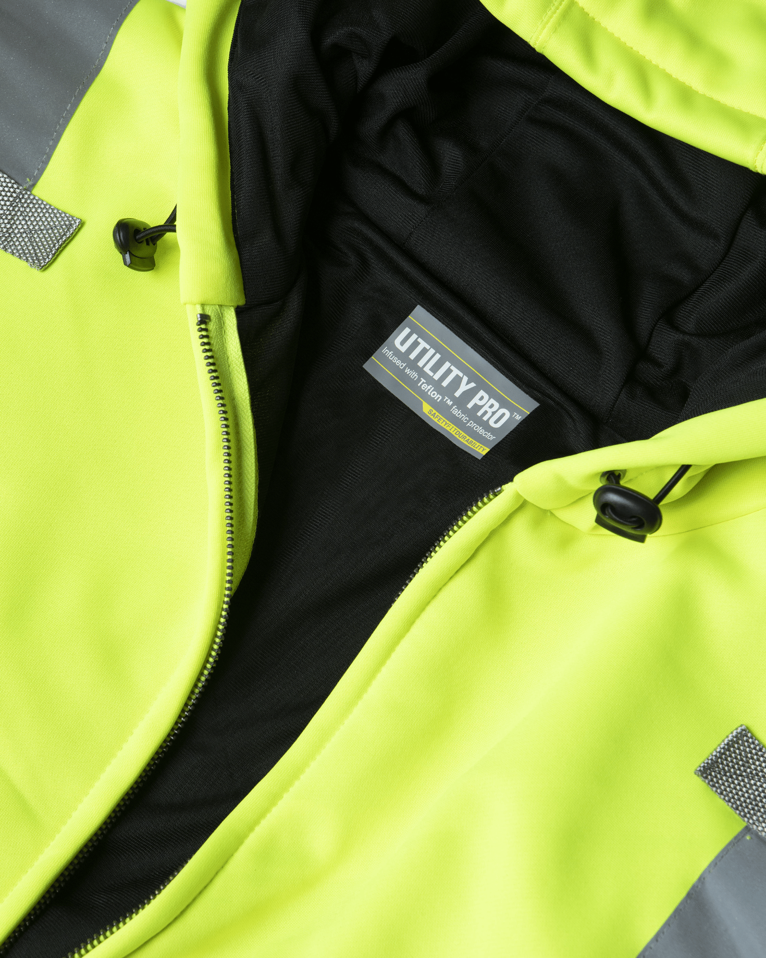 UHV425 HiVis Soft Shell Full Zip Hoodie featuring water-repellent design. The ideal hi vis hoodie for outdoor durability.