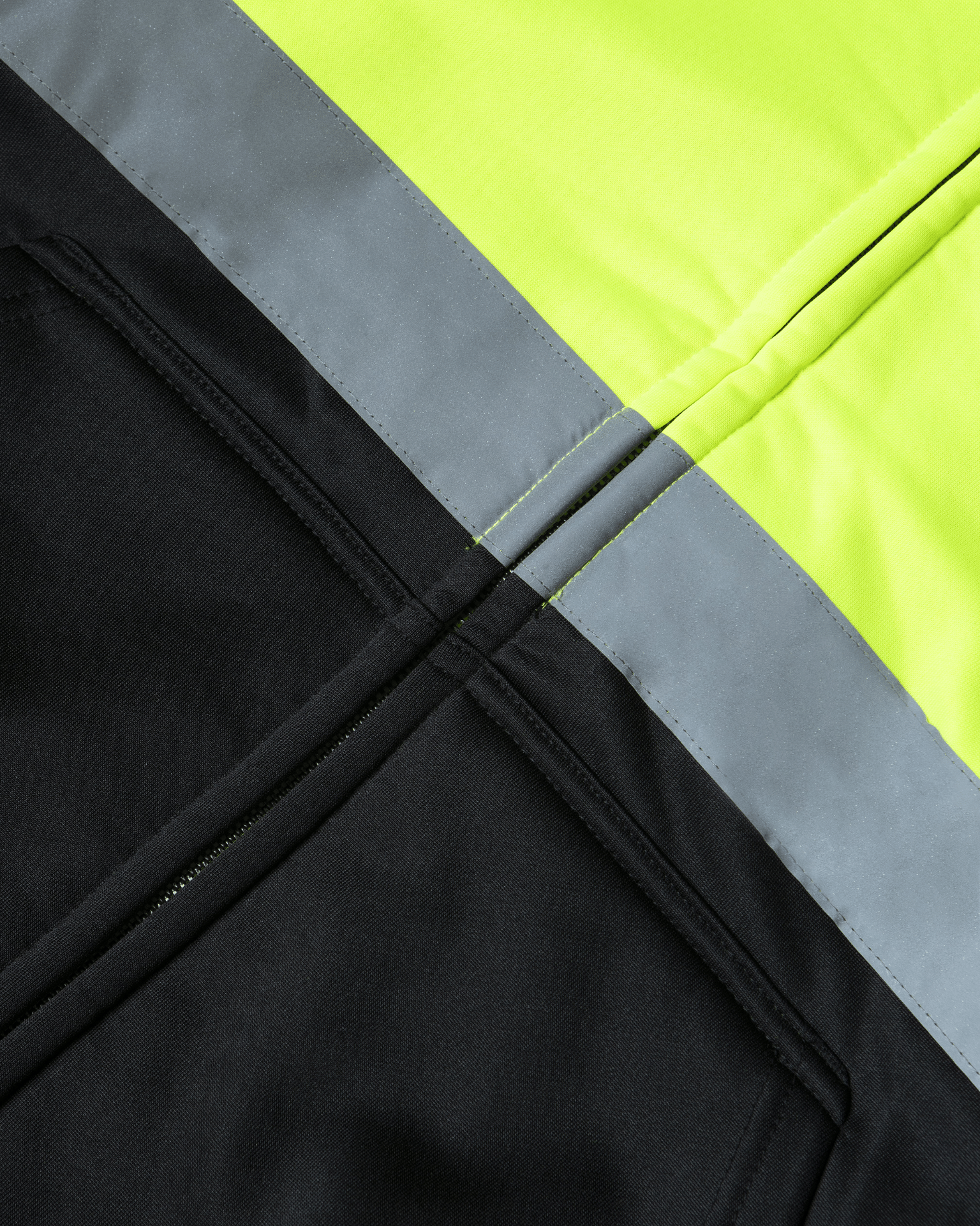 UHV425 HiVis Soft Shell Full Zip Hoodie illustrating ANSI Certified safety standards. Your go-to hi vis hoodie for professional use.