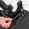 Model wearing Enhanced Rapid Clasp Retention Belt, showcasing its support for concealed carry.