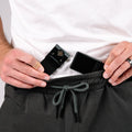 Enhanced Rapid Clasp Retention Belt displayed on a table, demonstrating its lightweight design as a retention belt for concealed carry.
