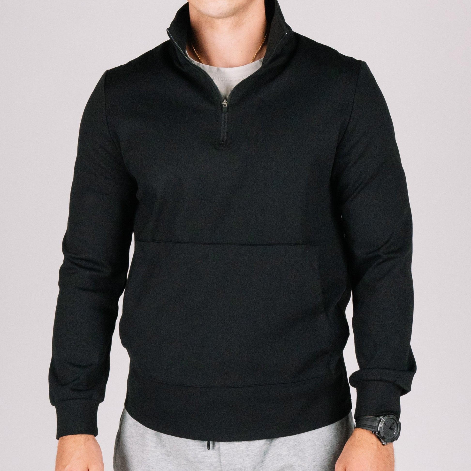 Durable Quarter Zip with waterproofing feature, ideal for outdoor concealed carry apparel.