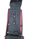 Black and red backpack with multiple compartments on a white background