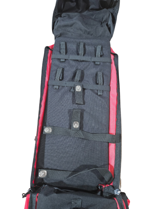 Black and red backpack with multiple compartments on a white background