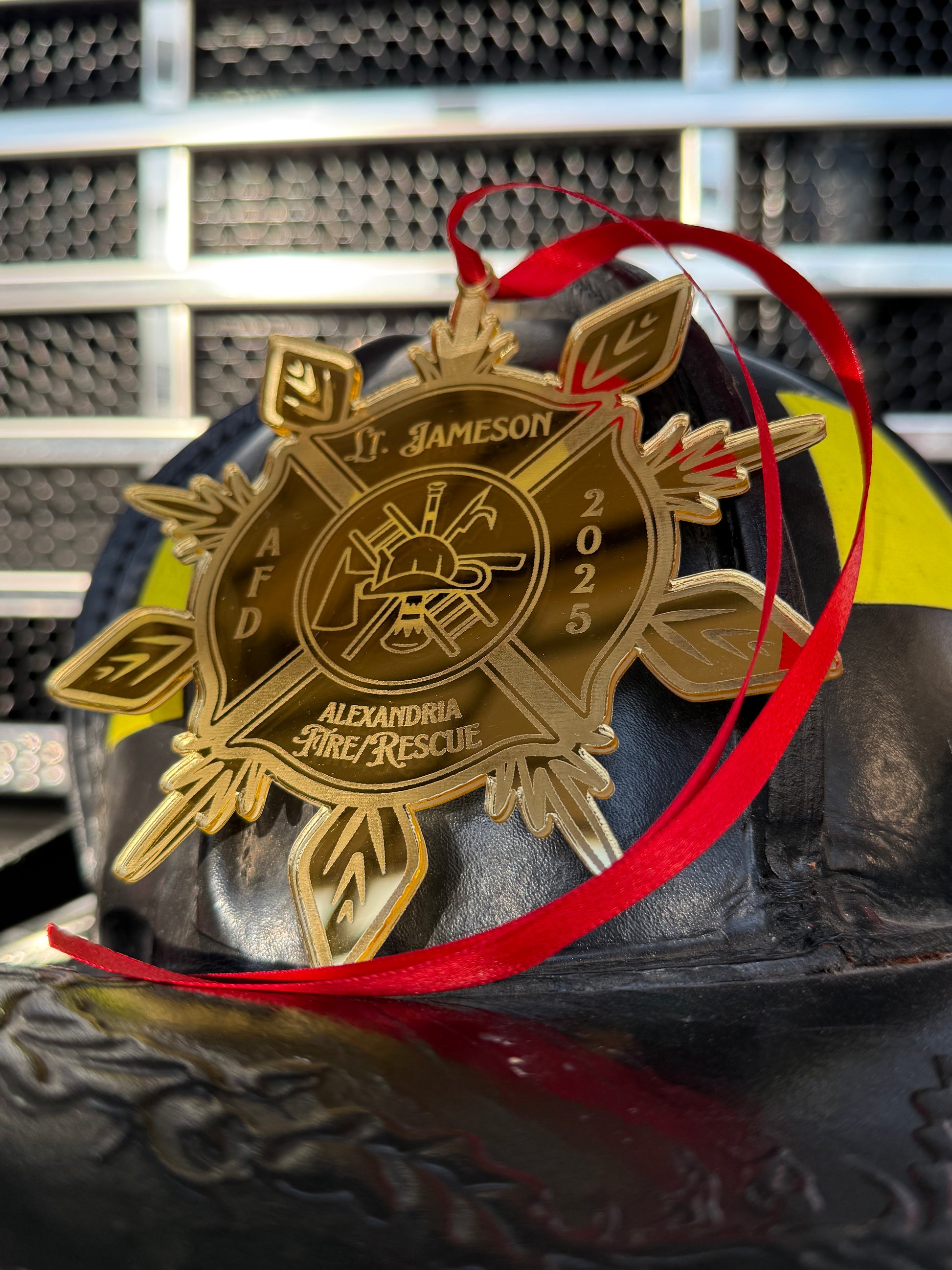 Customizable Fire Department Ornament showcasing personalized department names and a shiny gold design.