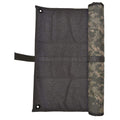 Tactical Patch Mat displayed outdoors, showcasing its usability in different environments.