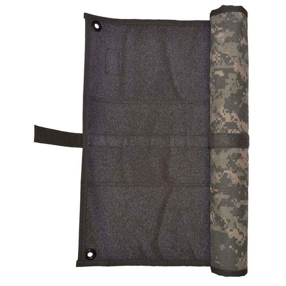 Tactical Patch Mat displayed outdoors, showcasing its usability in different environments.