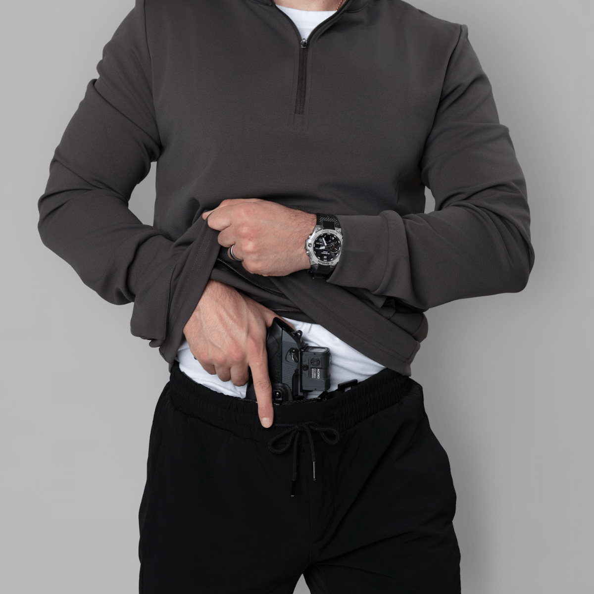 Durable Quarter Zip featuring reactive pockets, enhancing features of concealed carry apparel.