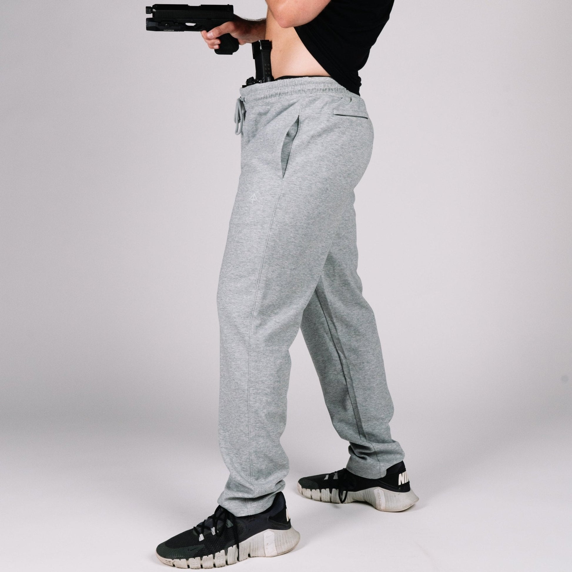 Dual YKK zippered pockets on the gray Carrier Sweatpants Mk.II, perfect for concealed carry sweatpants.