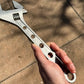 12 Inch Lightweight Corrosion Resistant Titanium Adjustable Wrench held in hand