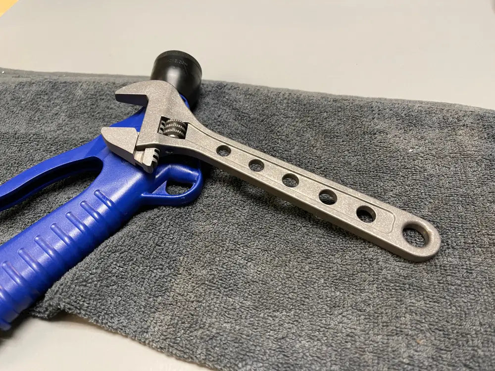 Adjustable wrench with blue rubber grip handle in 8 Inch Titanium Adjustable Wrench