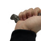 Adjustable Wrench - Titanium 6 Inch held in hand, perfect for versatile tasks, NSN Pending